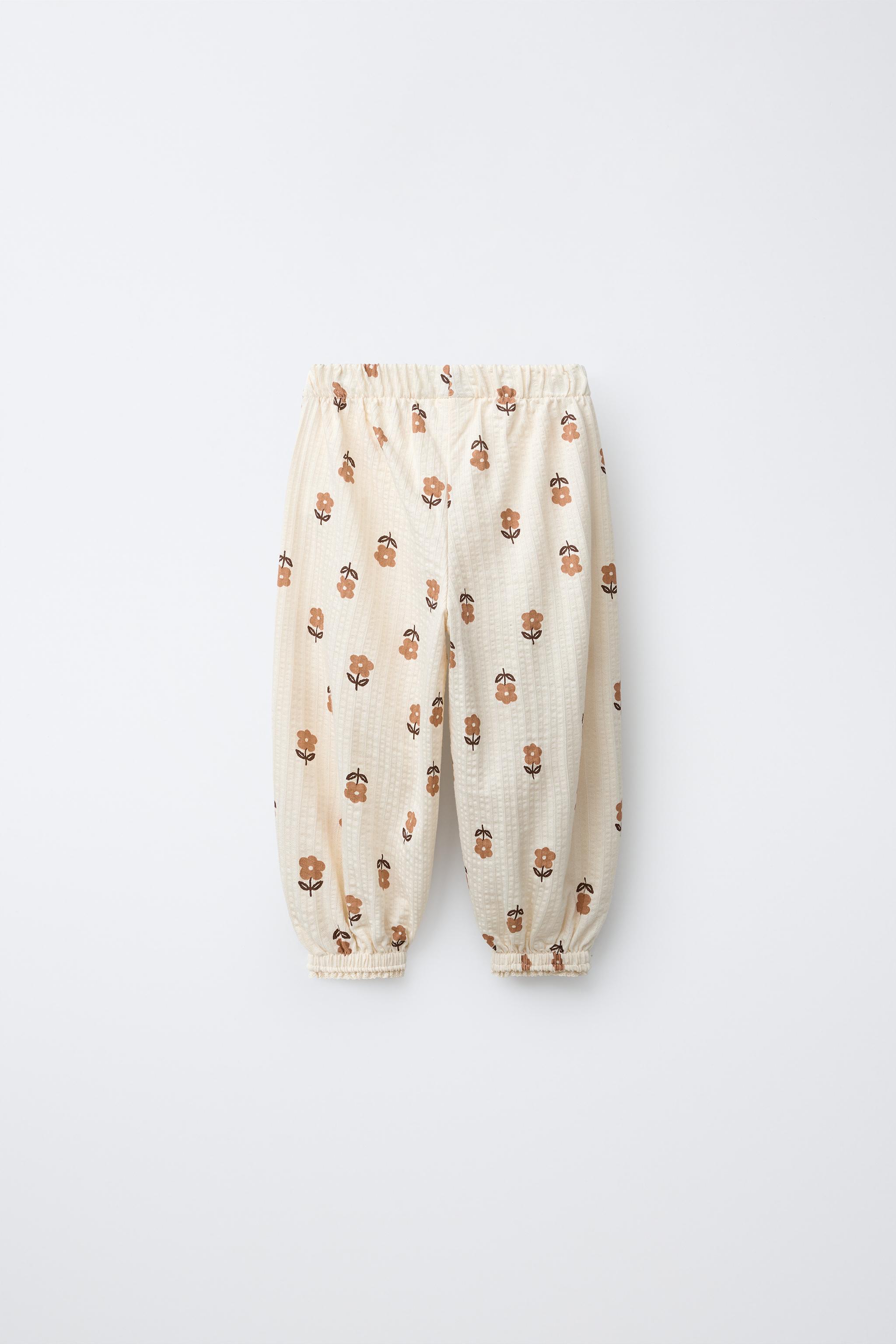 PANTALON DE JOGGING À FLEURS AVEC DÉCOR EN DENTELLE
